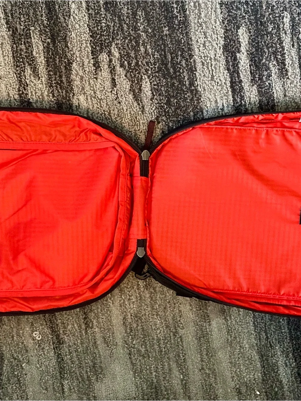 cotopaxi Black Sling Pack with Red Trim and Blue Accent - Picture 3 of 3